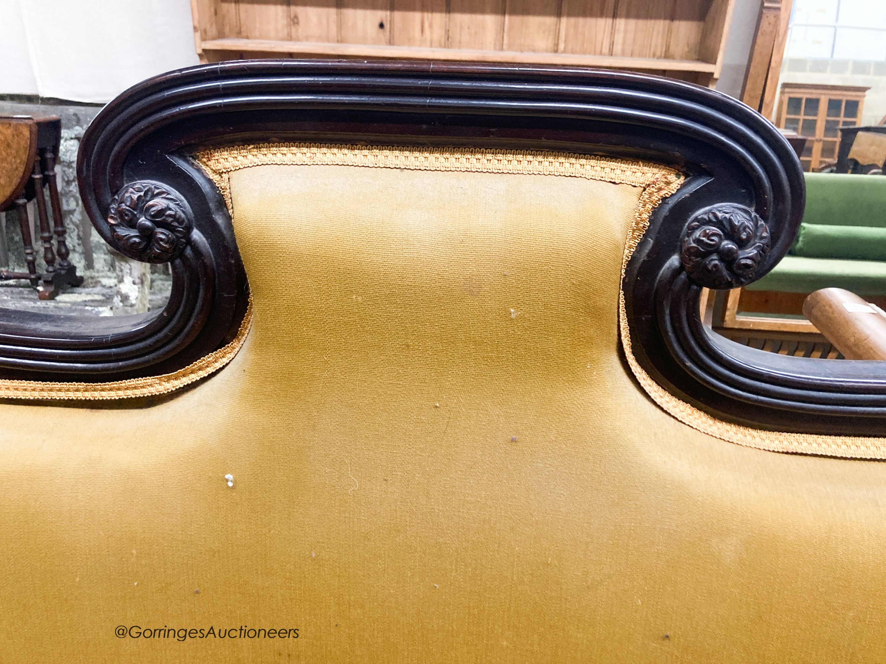 A Regency ebonised settee, W.162cm D.70cm H.120cm